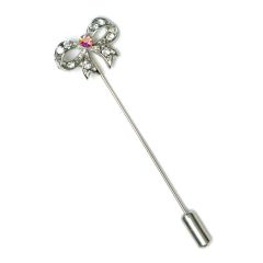 Metal pin bow with diamond