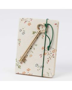 Flower textile notebook with golden key marker