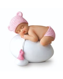 Figura niña bebé rosa durmiendo sobre huevo, 7,5x8cm.