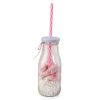 Glass bottle with pink straw confetti and 12 candies
