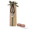 Bracelet with tree/life is a gift medal and 2 chocolates