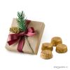 Kraft box with 4 chocolates and pineapple and fir branch